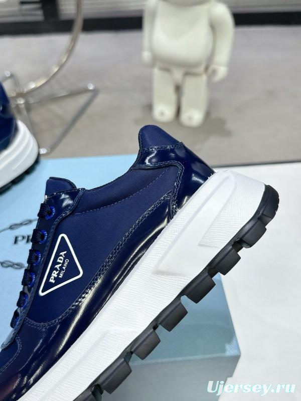2025 Women Prada Blue Leather Sneakers KFY00310