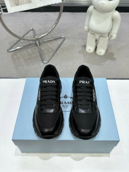 2025 Unisex Prada Black Leather Sneakers KFY00310