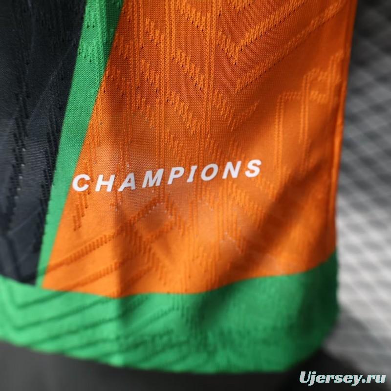 Player Version 2025 Ivory Coast Black with Elephant Graphic and Orange Stripes Jersey