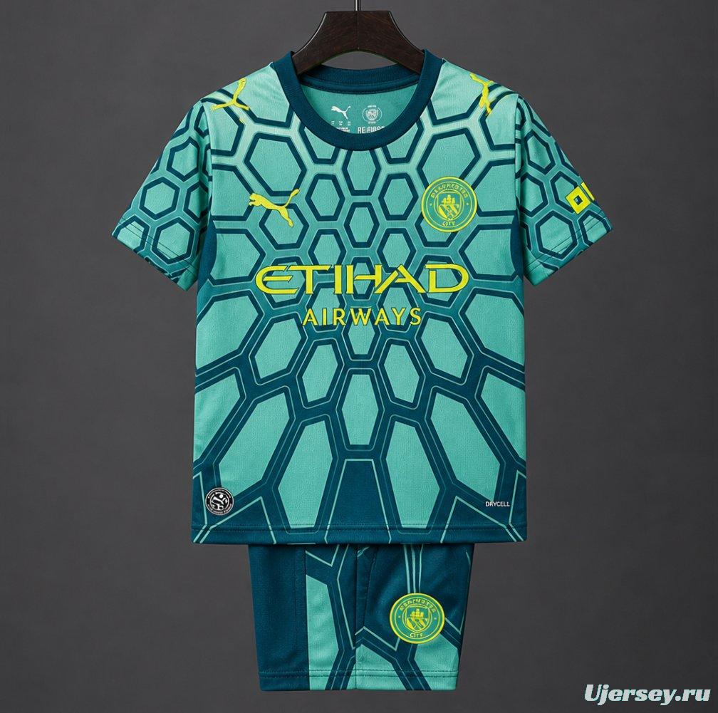 26/27 Kids Manchester City Vibrant Green Goalkeeper Jersey With Dark Blue Geometric Pattern.